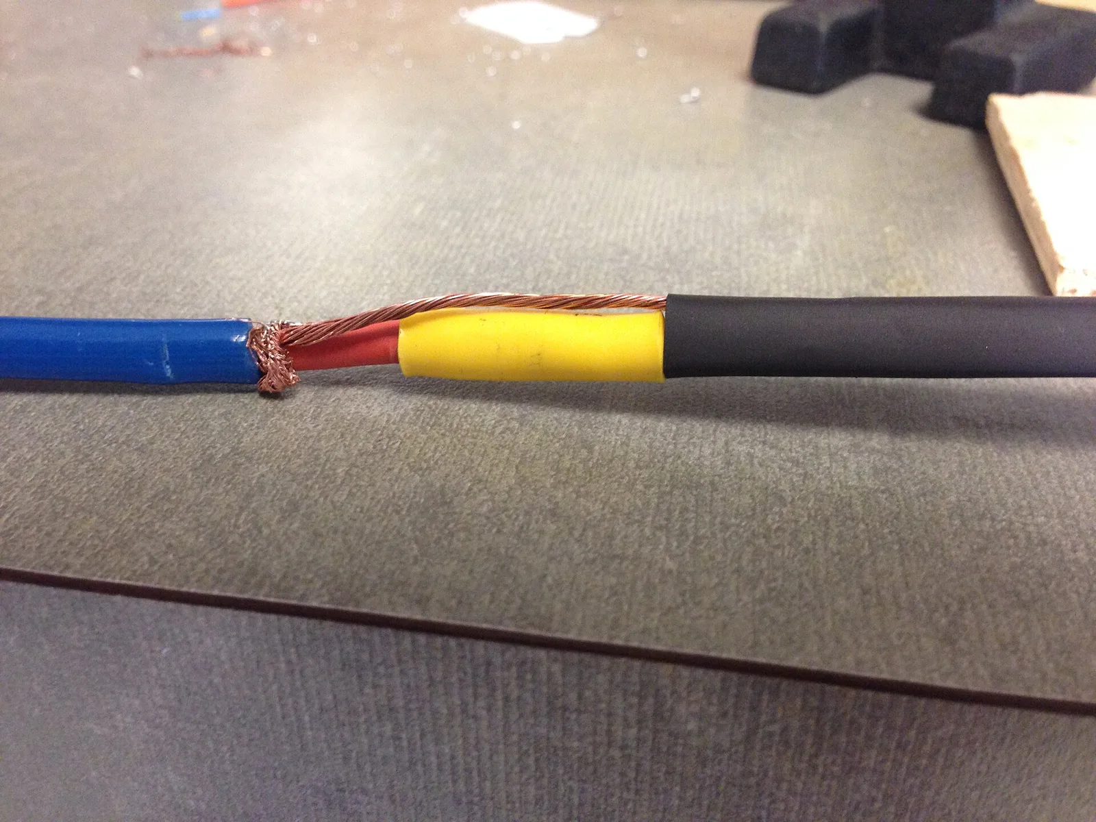 Wire joint sealed with heat-shrink